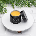 SHA With a Passion body butter in a black 4 oz jar